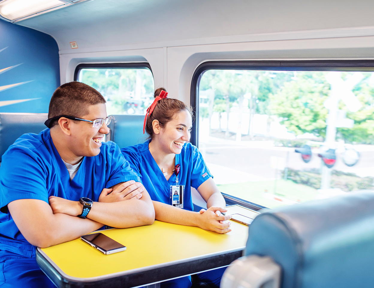 Two medical students riding SunRail.