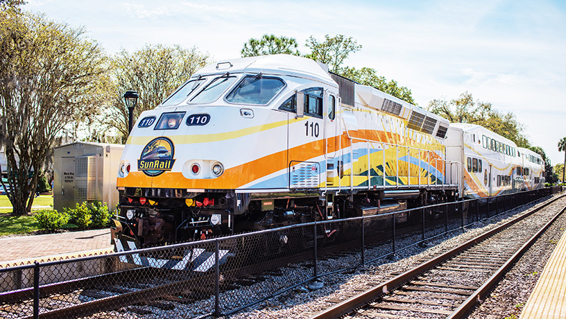Landing Page image - SunRail Train traveling on the tracks