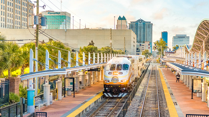 Landing Page image - Aerial image of Lynx Central Station and SunRail Train