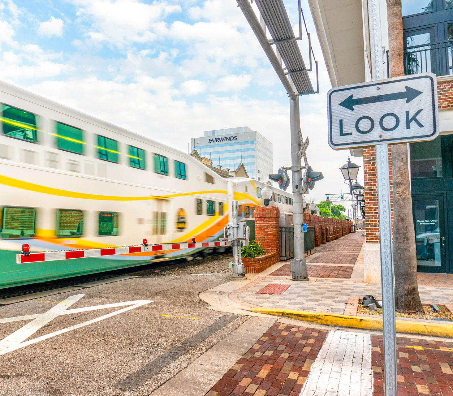 Look for trains sign with SunRail Train crossing in the background.