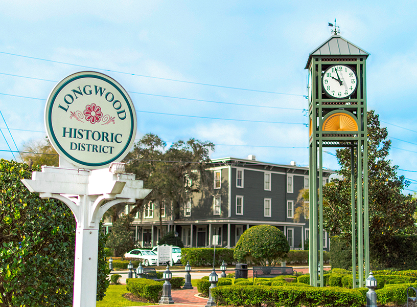 Clock tower and Longwood Historic District Sign