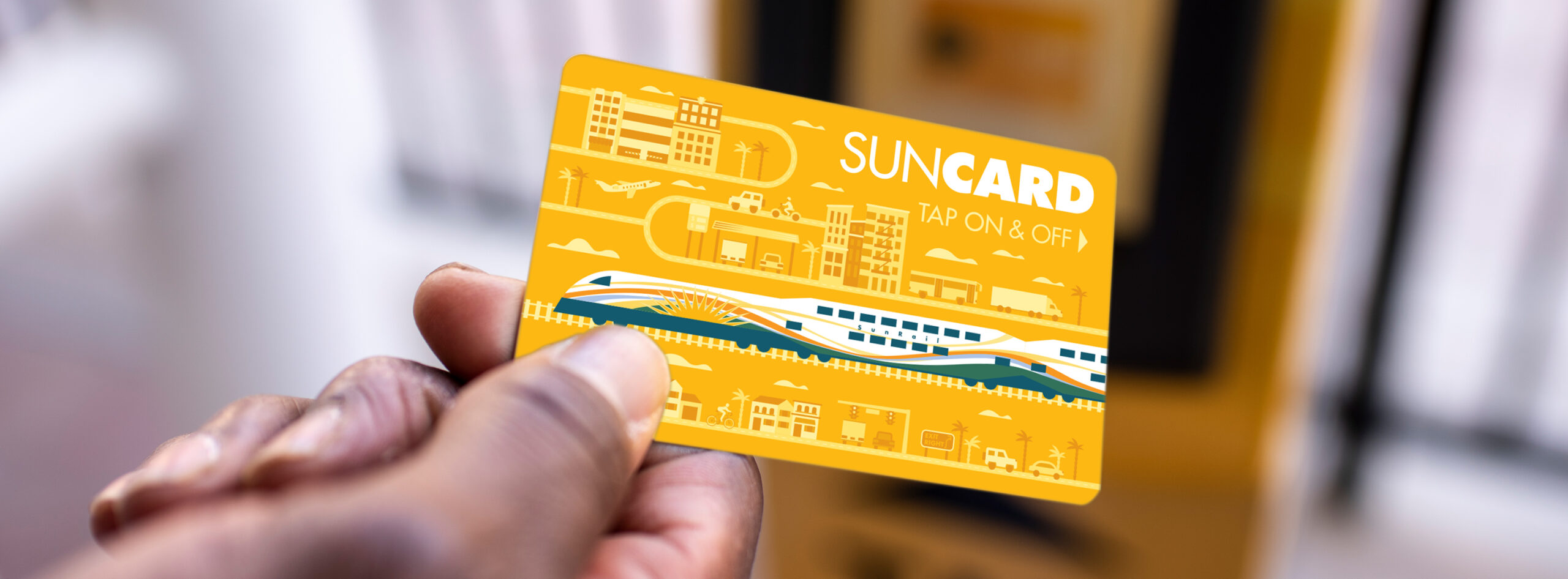 Masthead image - Person tapping on at a TVU with their SunCard.