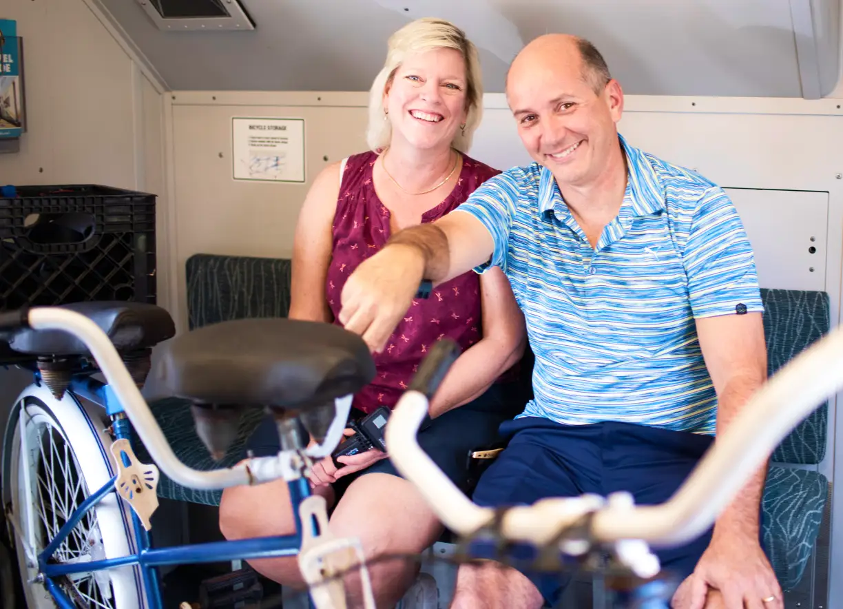 With onboard bike storage, a couple with their tandem bike ride SunRail to their next bike spot.