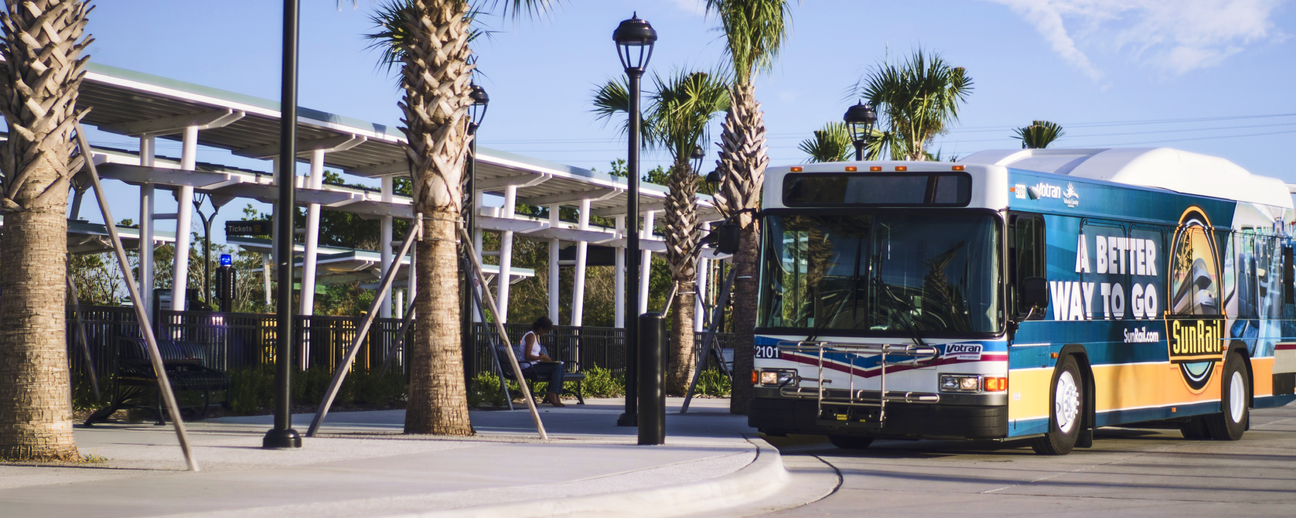 Votran bus arriving at the DeBary SunRail Station.