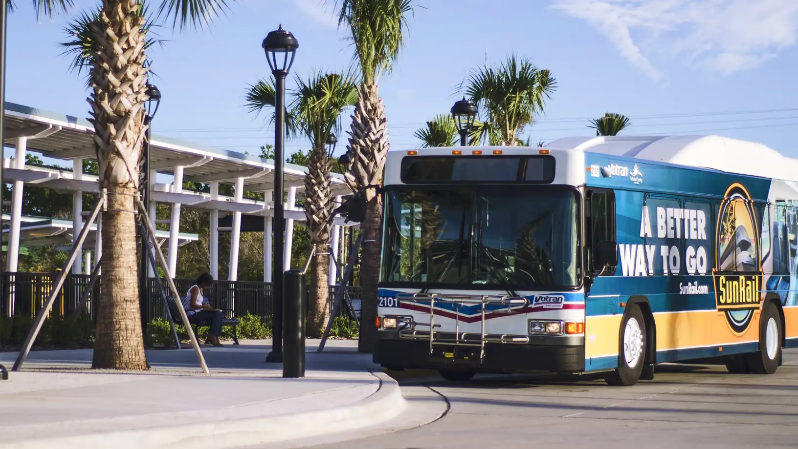 Votran bus arriving at the DeBary SunRail Station.